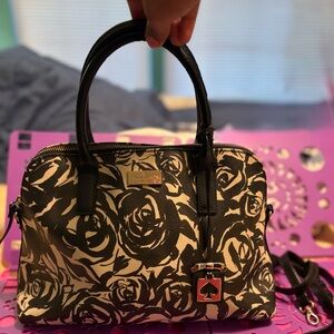 Kate Spade Black and Cream Floral Satchel comes with strap